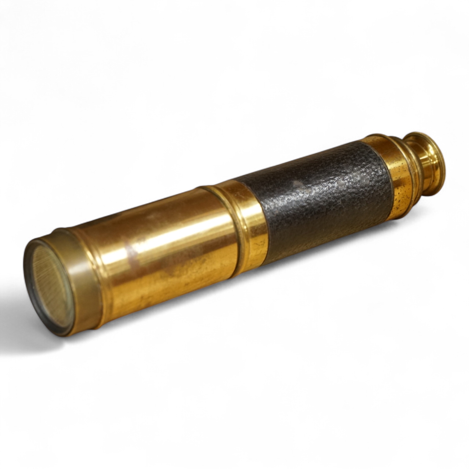 A late 19th/early 20th century three drawer brass telescope with leather covered grip, 59.5cm extended, 21cm when shut.